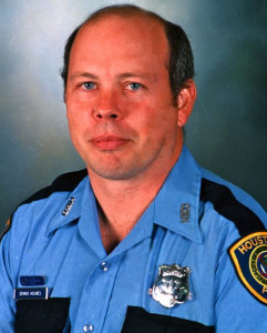 Dennis E. Holmes