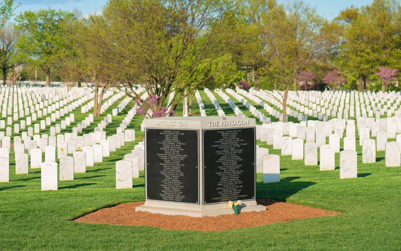 On September 12, 2002, a funeral service was conducted at the Memorial Amphitheater for the 184 victims of the terrorist attack on the Pentagon on 9/11. Following the service, a group burial was held in Section 64. A five-sided memorial marks the group burial. It resembles the Pentagon, which is in visible distance, although the five sides are meant to memorialize the five victims whose remains were not recovered. The names of all the victims are listed on the marker in alphabetical order.
