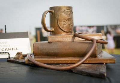 Fort Hood shooting hero Michael G. Cahill remembered in bronze Chief Warrant Officer 2 (Ret.) Michael G. Cahill, who was a voracious reader, is remembered with a coffee cup and stack of books including one "Calvin and Hobbes" collection, in a sculpture created by artist Troy Kelley, July 22, 2014.
