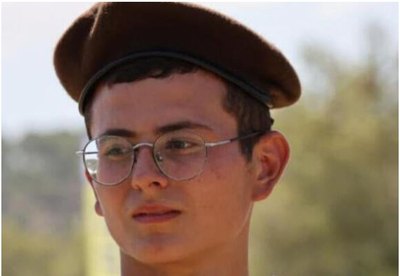 The late Matan Abergil, who jumped on his friends in an armored vehicle to protect them from a grenade thrown by Hamas terrorists on October 7, 2023. (Screenshot)