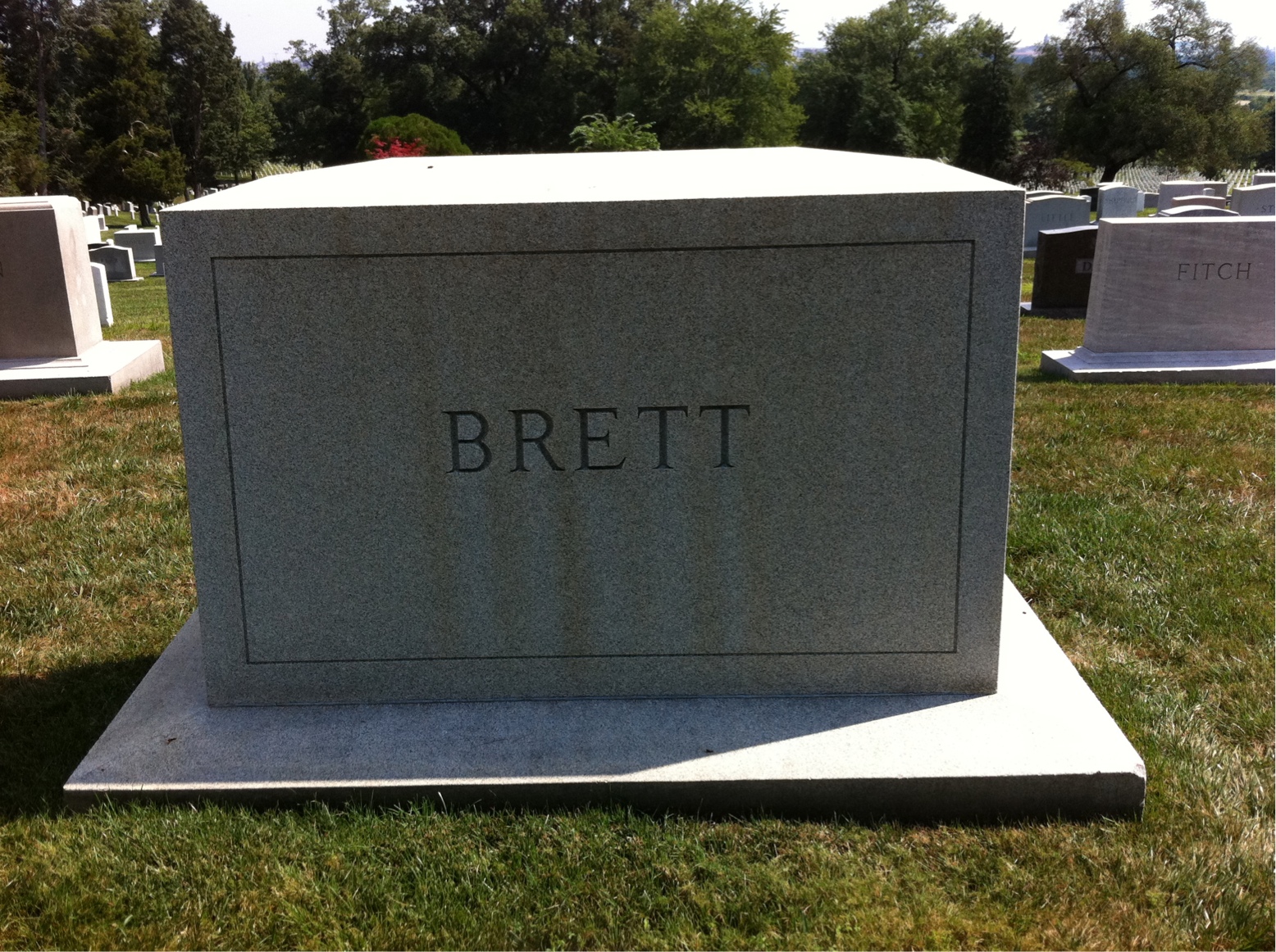 Headstone shared by 2 interments, including Lloyd M. Brett