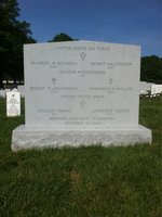Group marker, Arlington National Cemetery, Section 60, Grave 10595. Five airmen of the United States Air Force and two soldiers of the United States Army died together in a downed aircraft over Cambodia on 24 October 1964 and were buried together beneath one stone carrying all seven names. Front face, carrying the names.