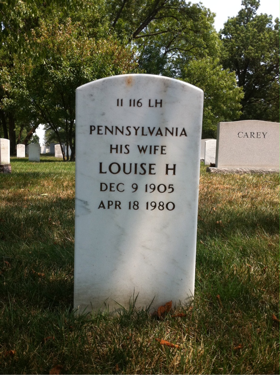 Headstone shared by 2 interments, including Oscar Schmidt