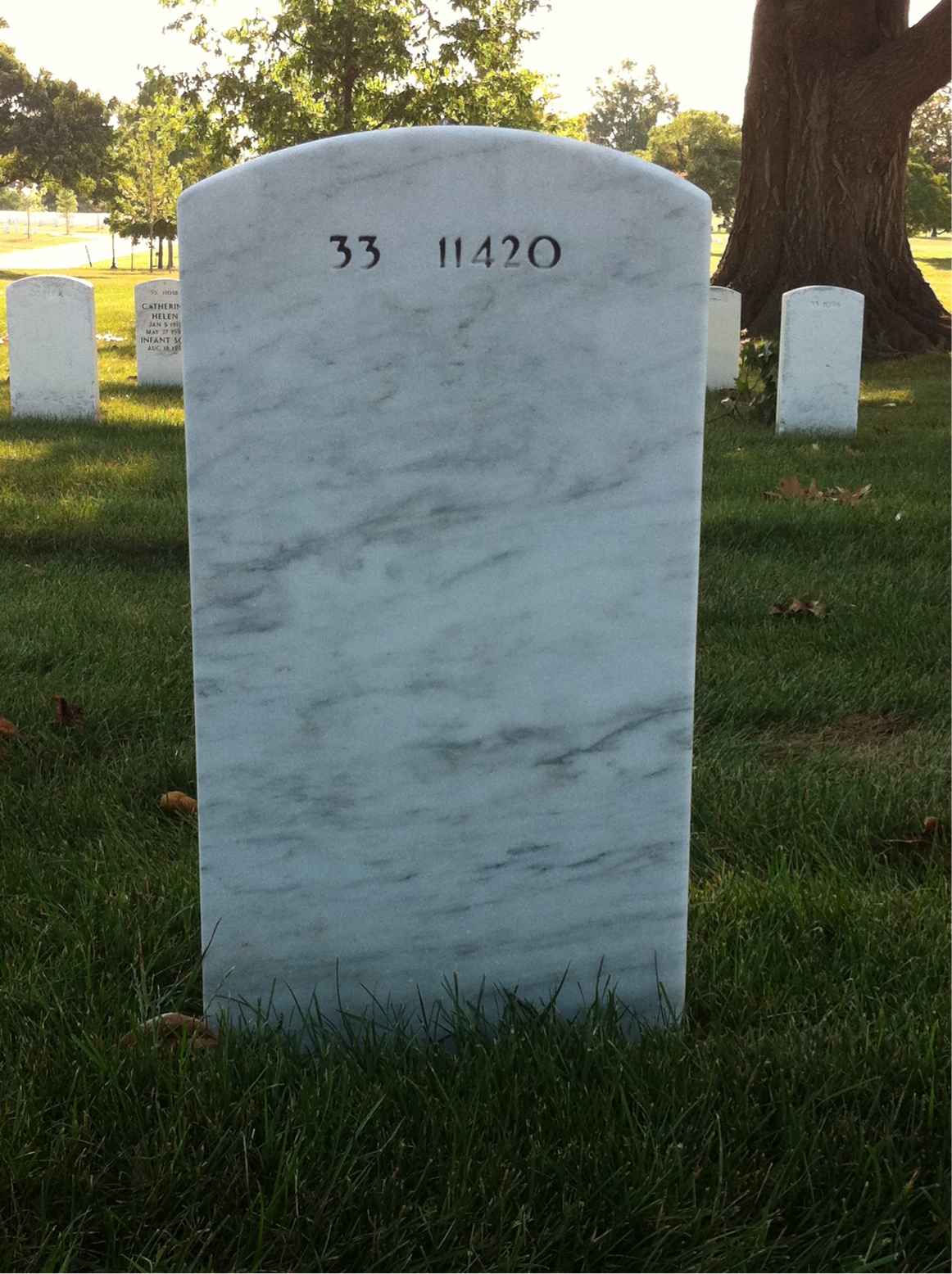 Back of headstone — Raymond Burke