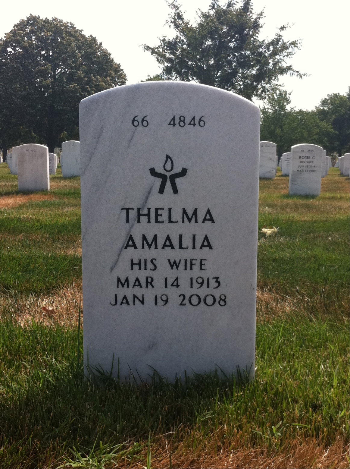 Back of headstone — Orlando Ezzo