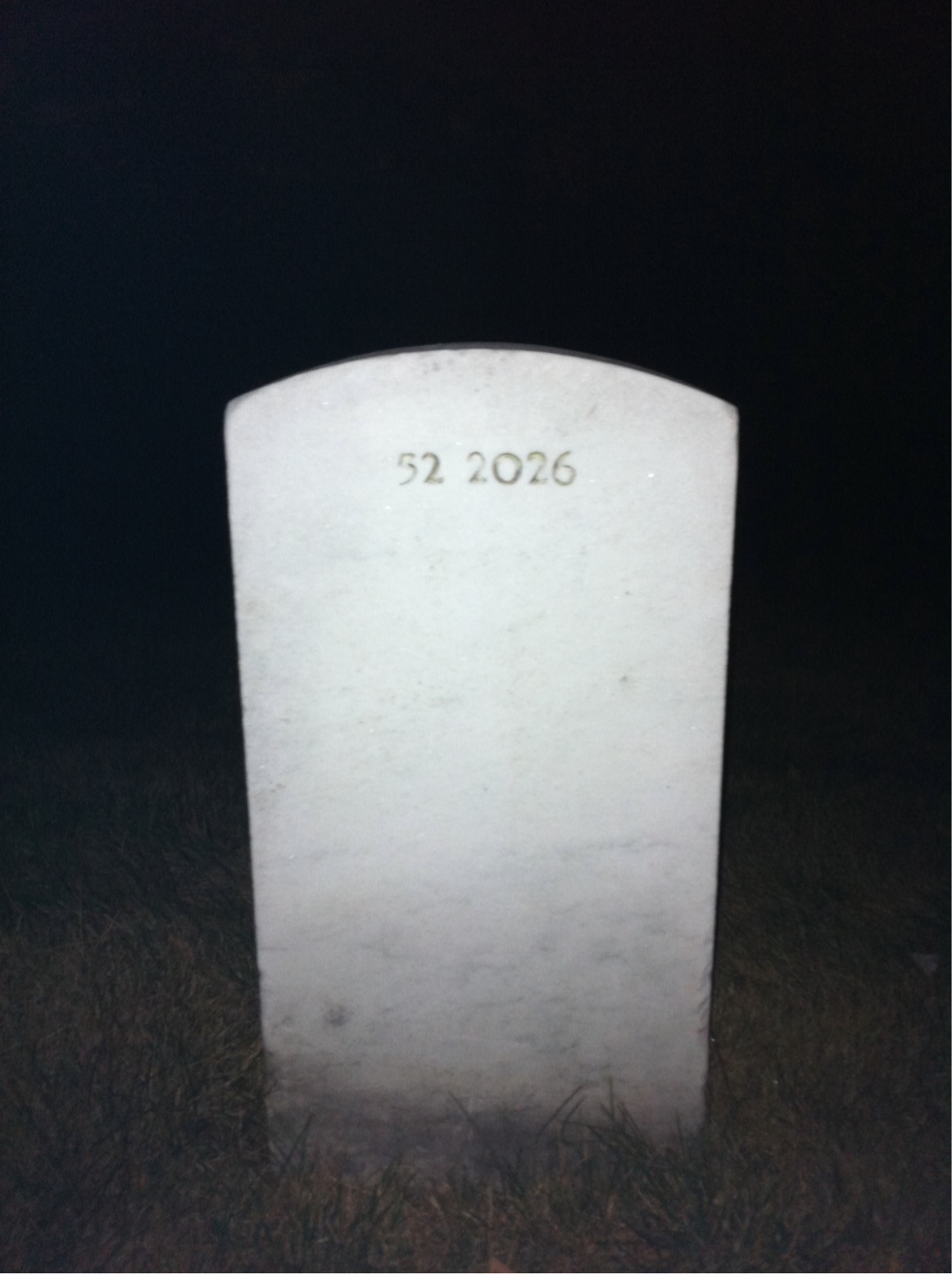 Back of headstone — Rolland Mitchell