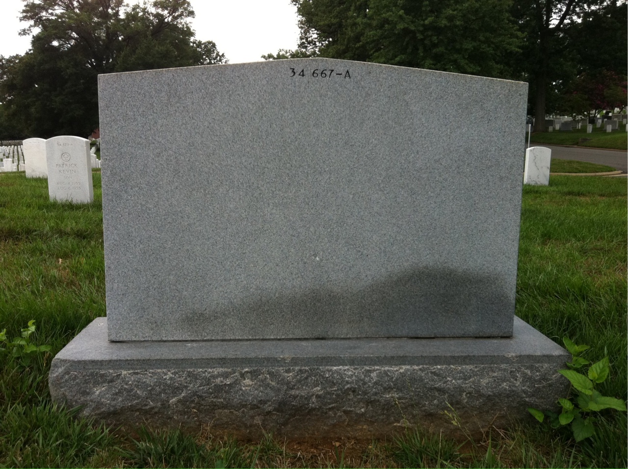 Headstone shared by 3 interments, including Howard Philip Purcell