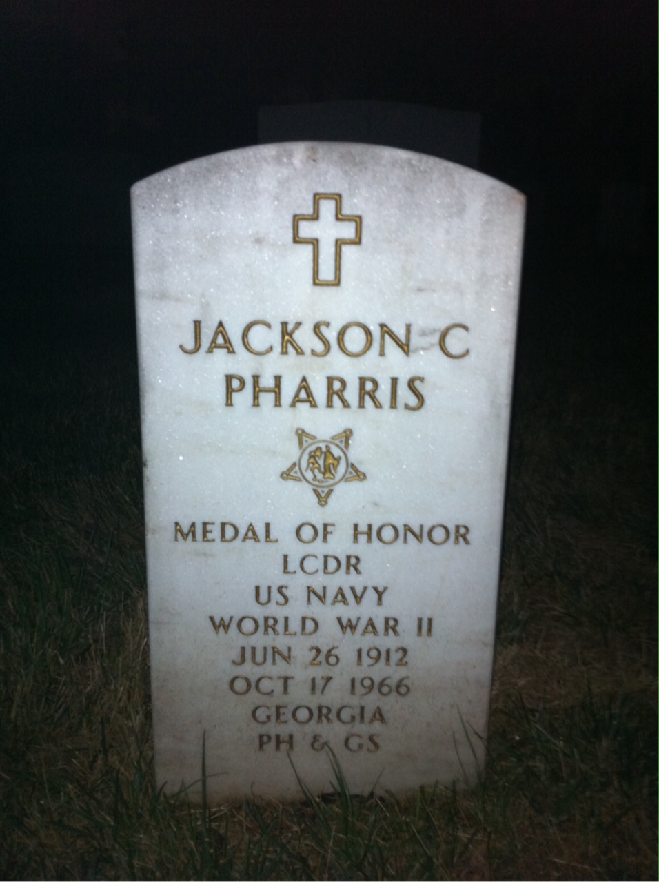 Headstone shared by 2 interments, including Jackson C. Pharris