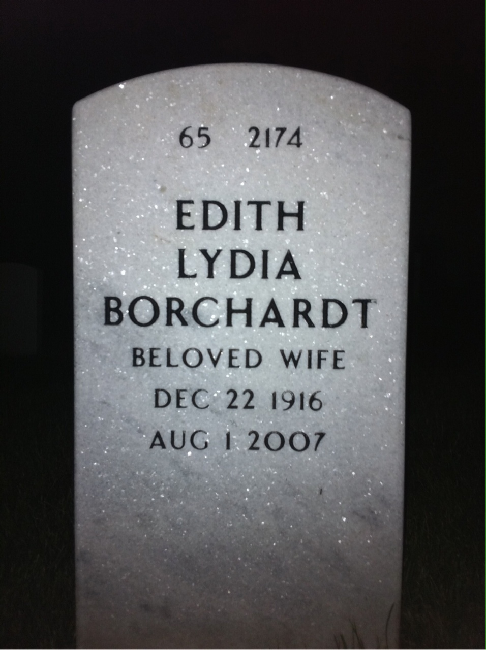 Back of headstone — Alfred Caron