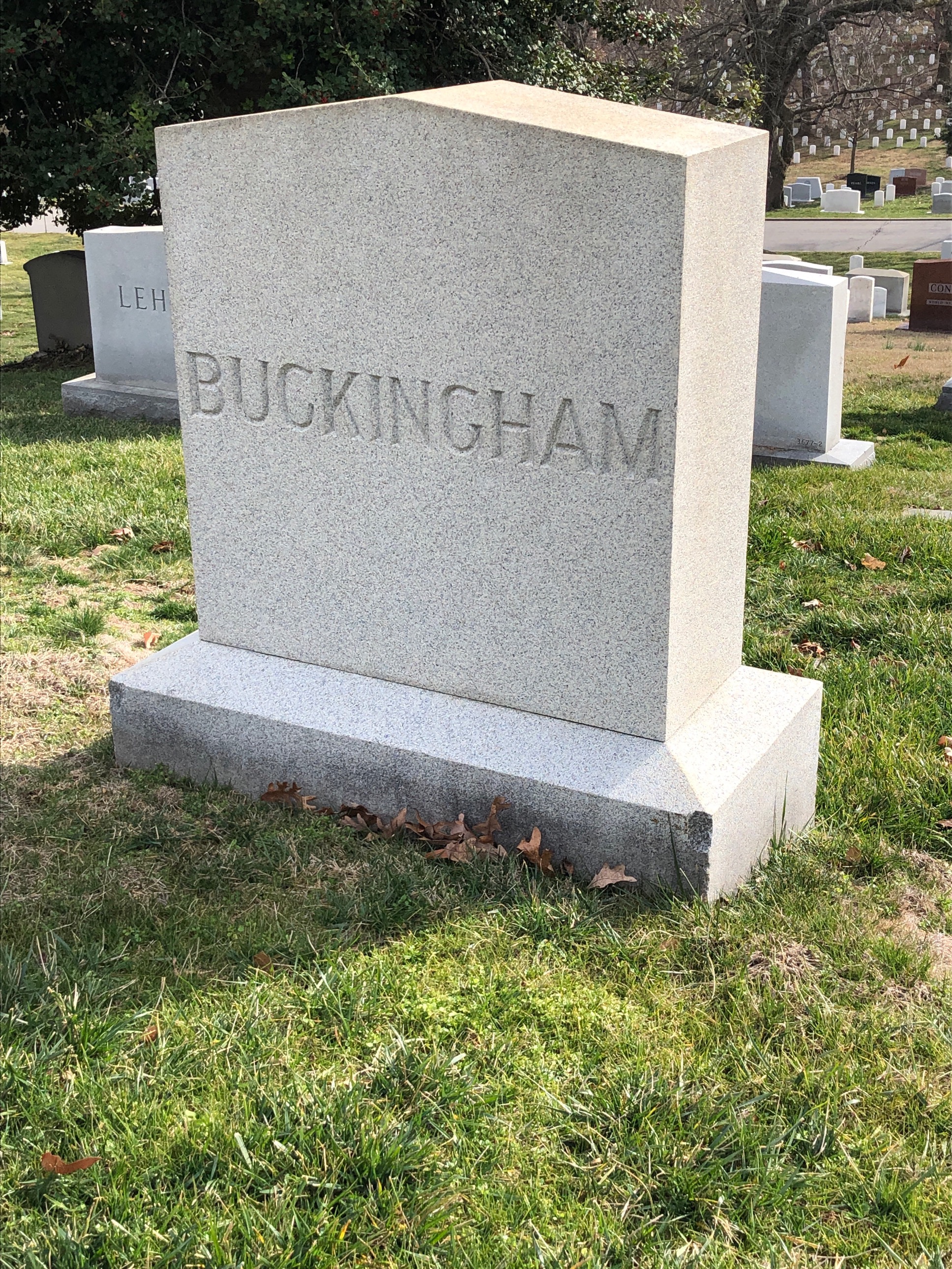 Headstone shared by 3 interments, including David E. Buckingham