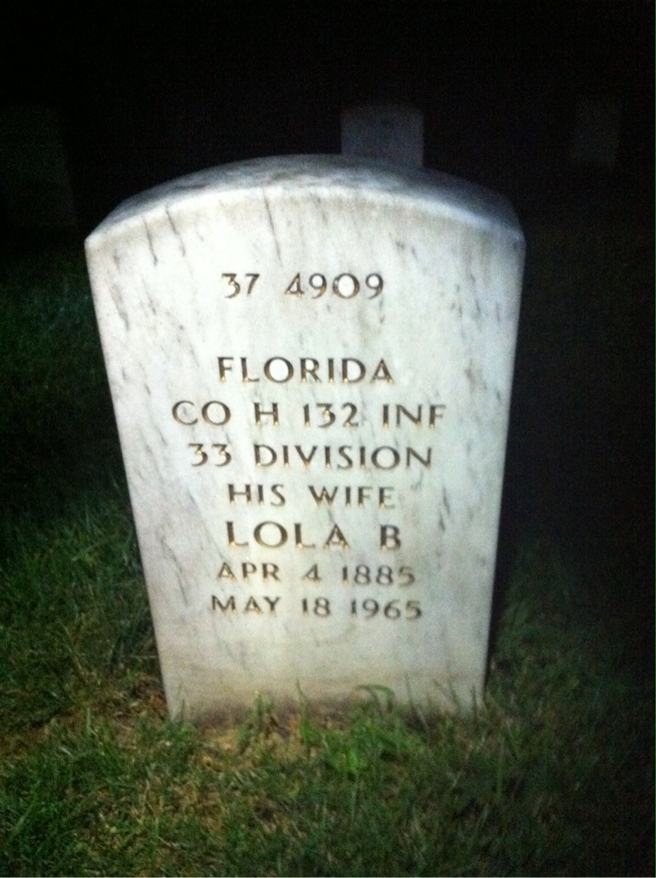 Headstone shared by 2 interments, including Berger Loman