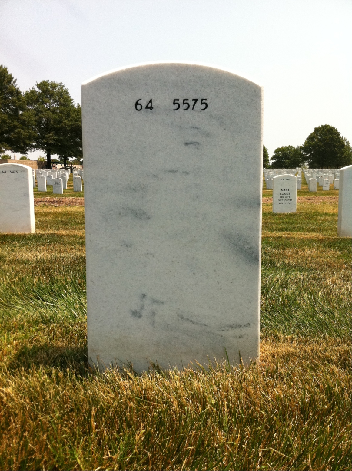 Back of headstone — Milton Benson