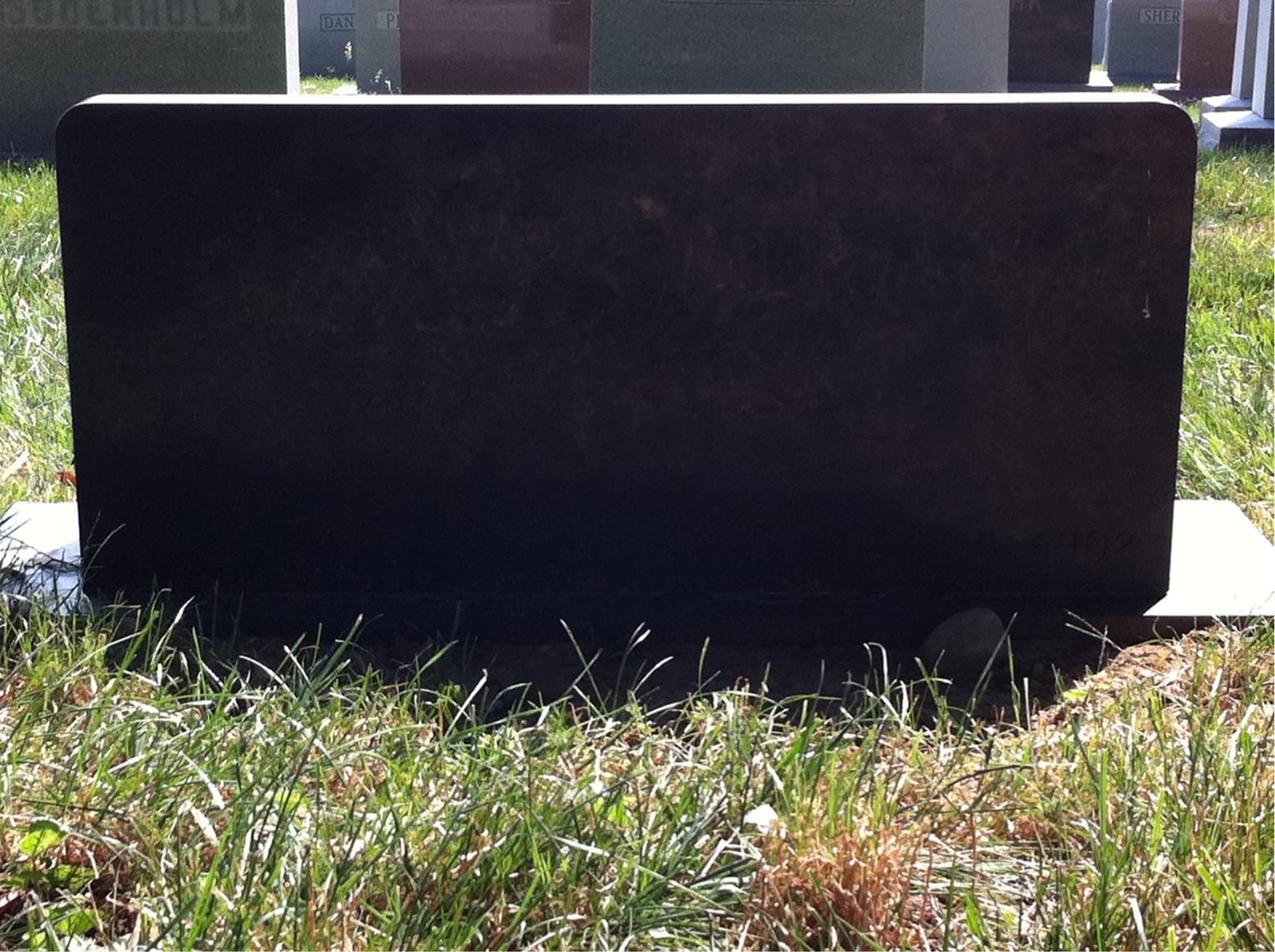 Back of headstone — Muriel Collins