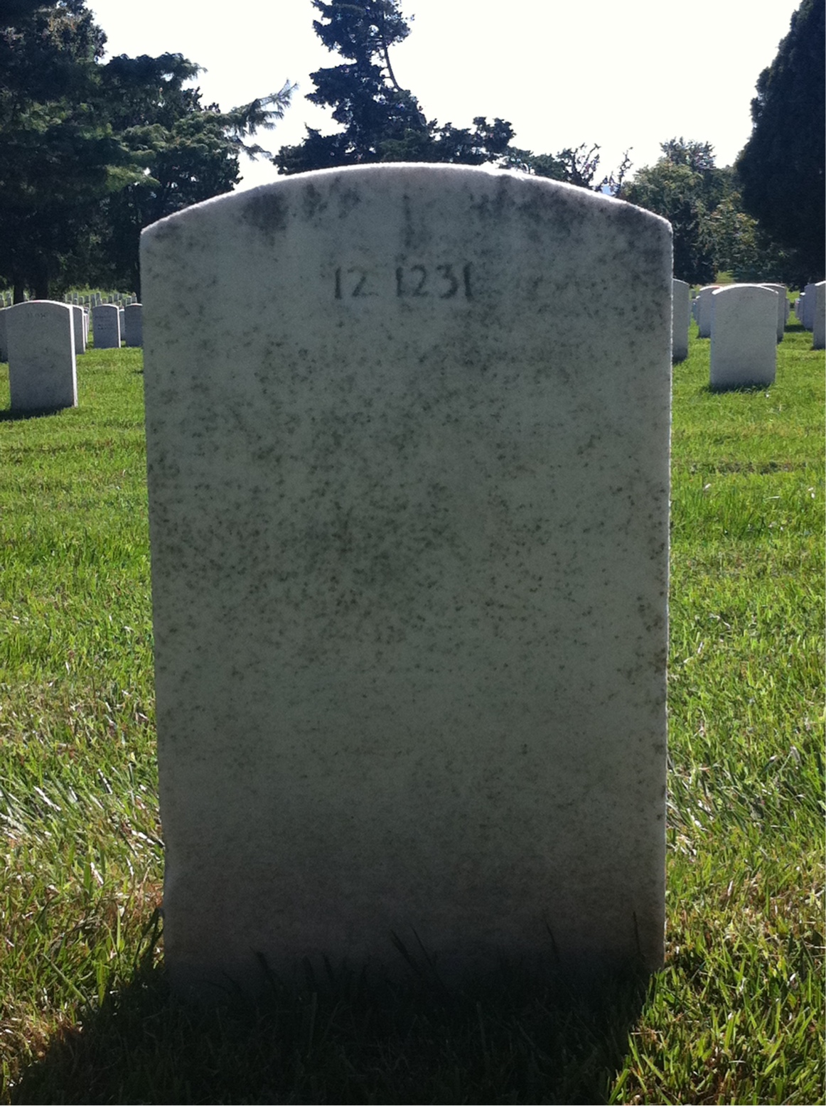 Back of headstone — Earl Baker
