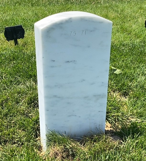 Back of headstone — Thomas J Carey