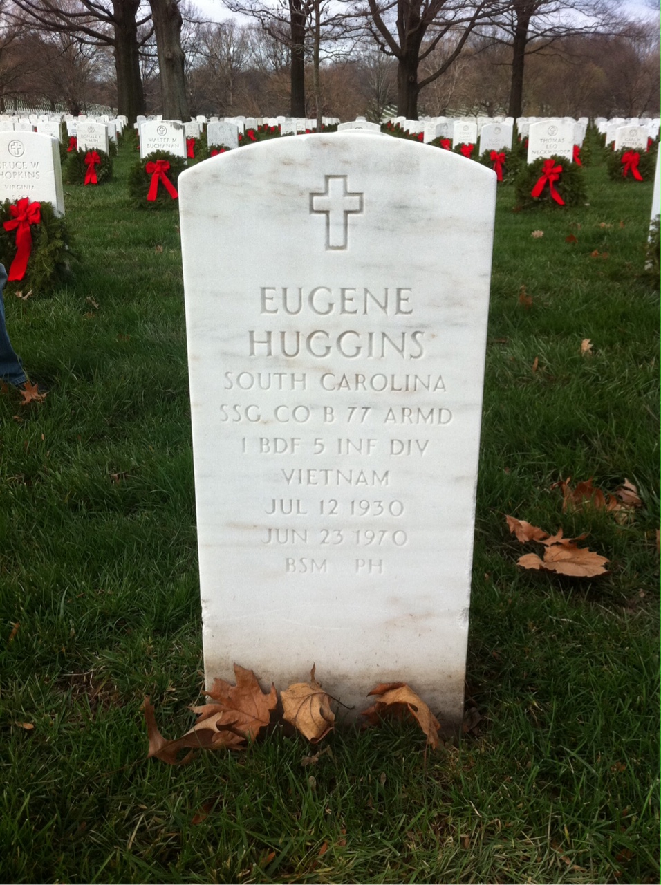 Headstone shared by 2 interments, including Eugene Huggins