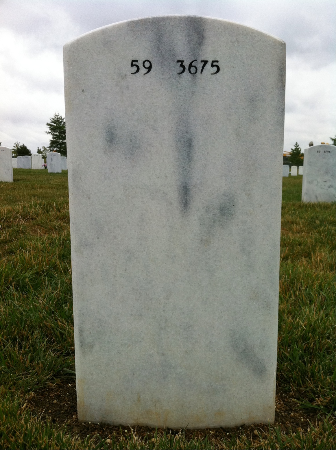 Back of headstone — Norman Ivins