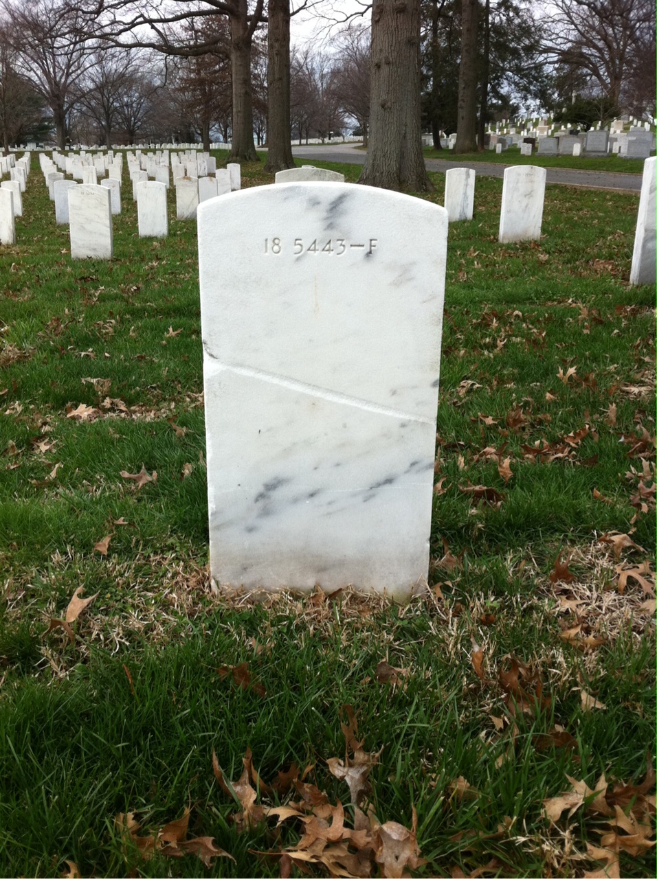 Back of headstone — Leslie Cox