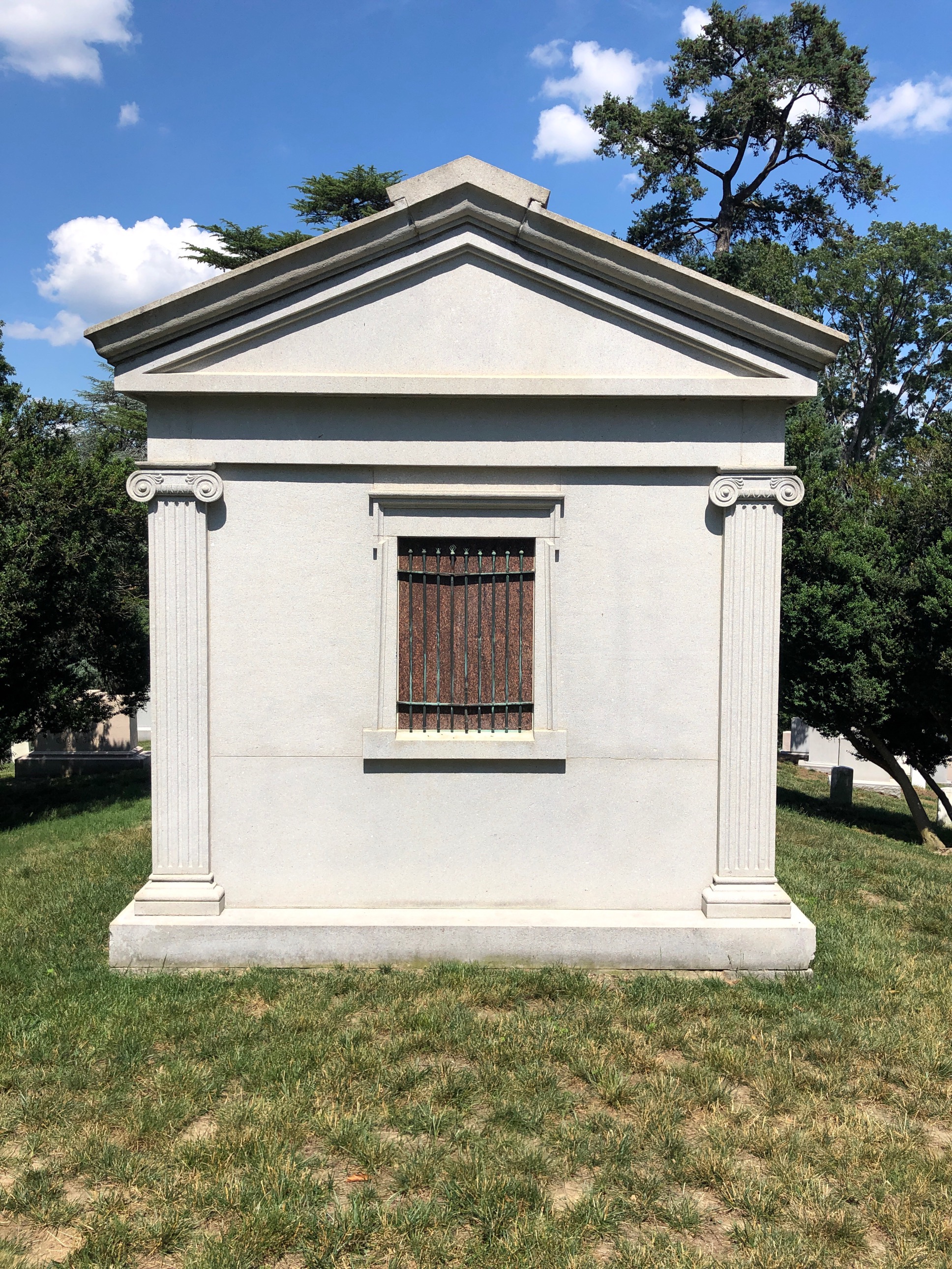 Headstone shared by 14 interments, including Nelson A. Miles