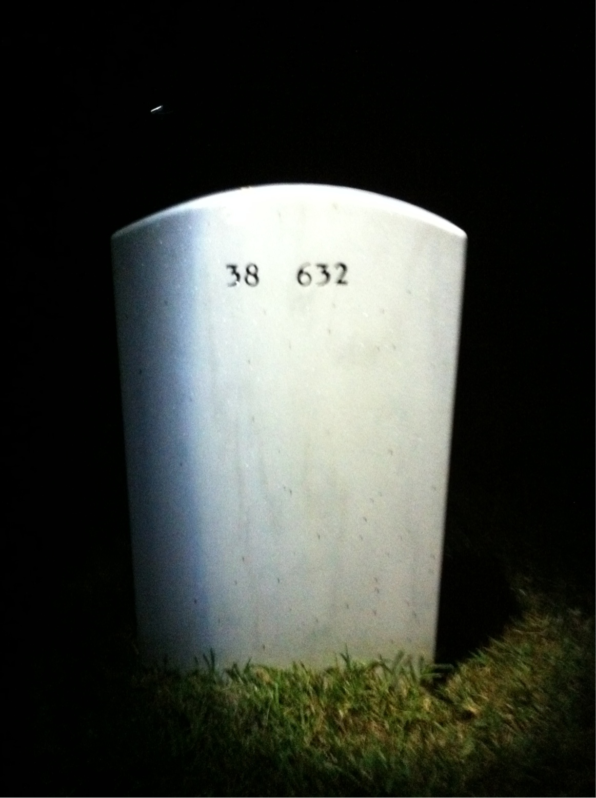 Back of headstone — Rolland Atuwo