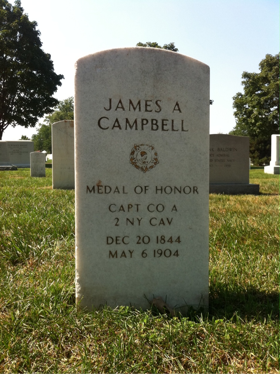 Headstone shared by 3 interments, including James A. Campbell