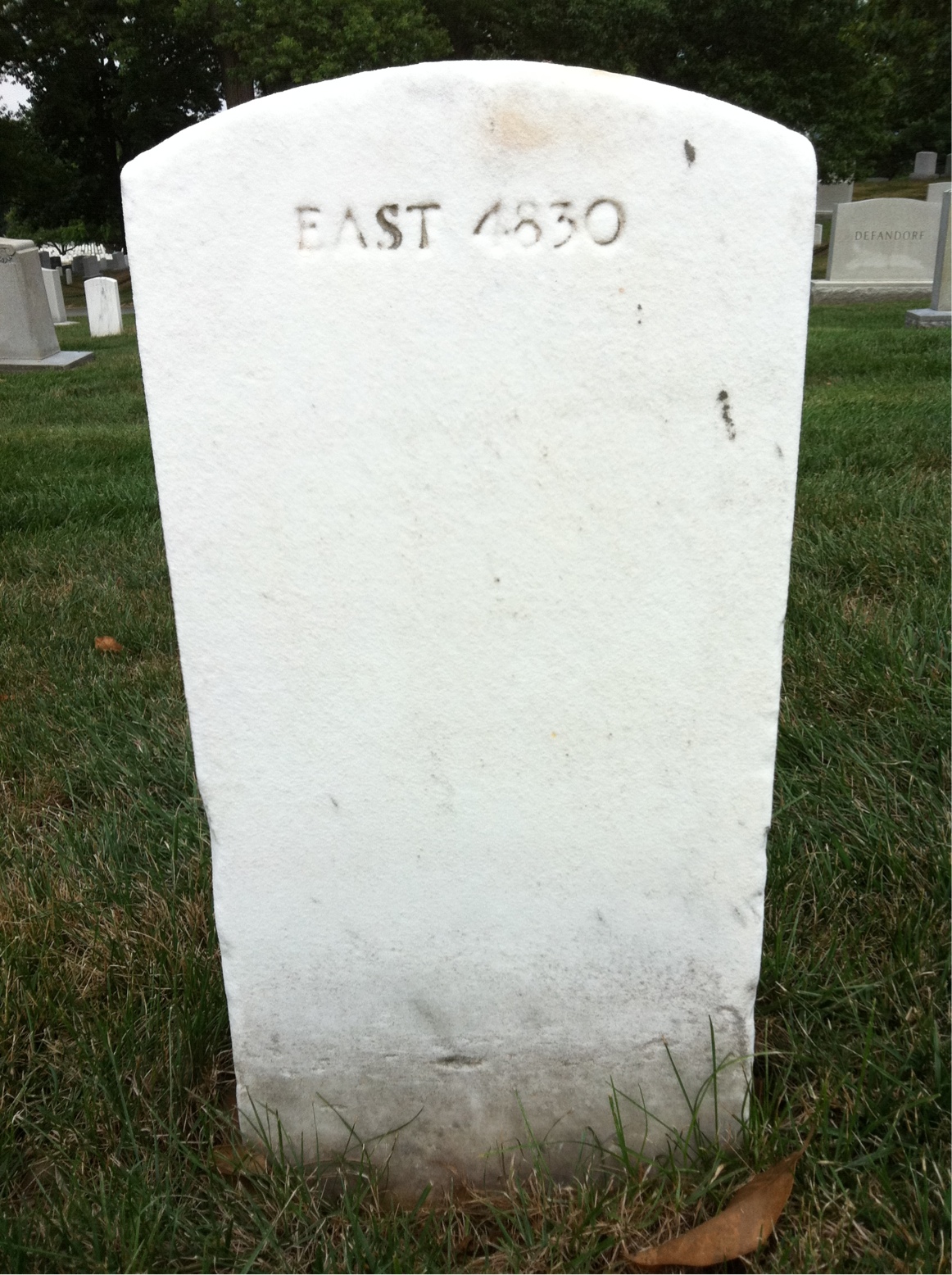 Back of headstone — Claude Moore