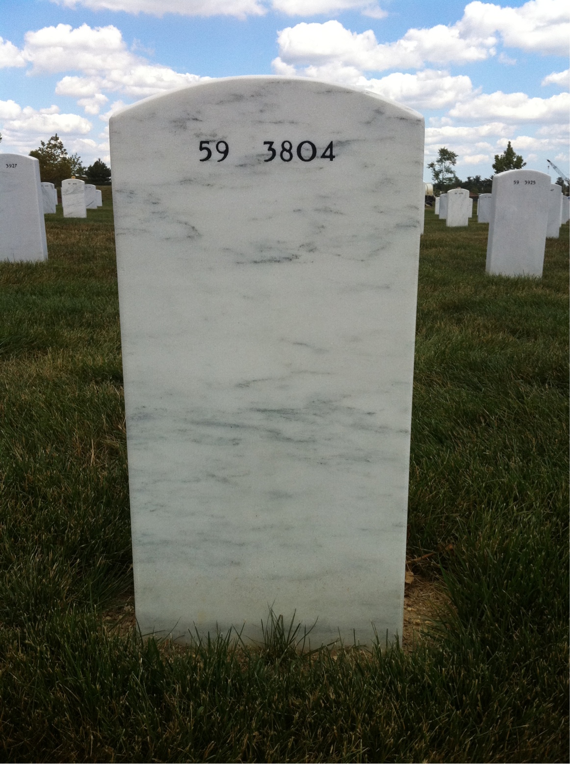Back of headstone — Armand Rowley