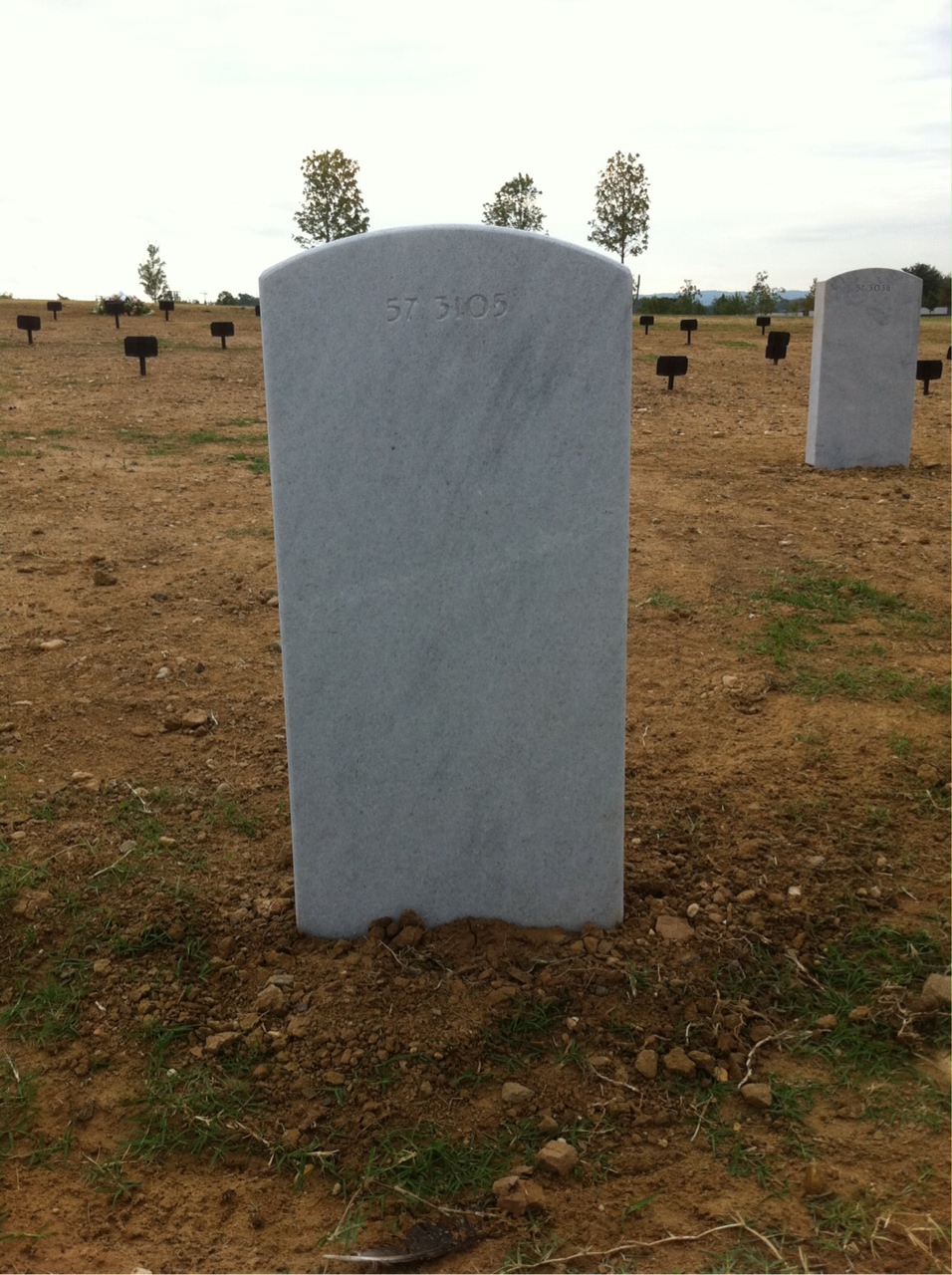 Back of headstone — James E Malcolm