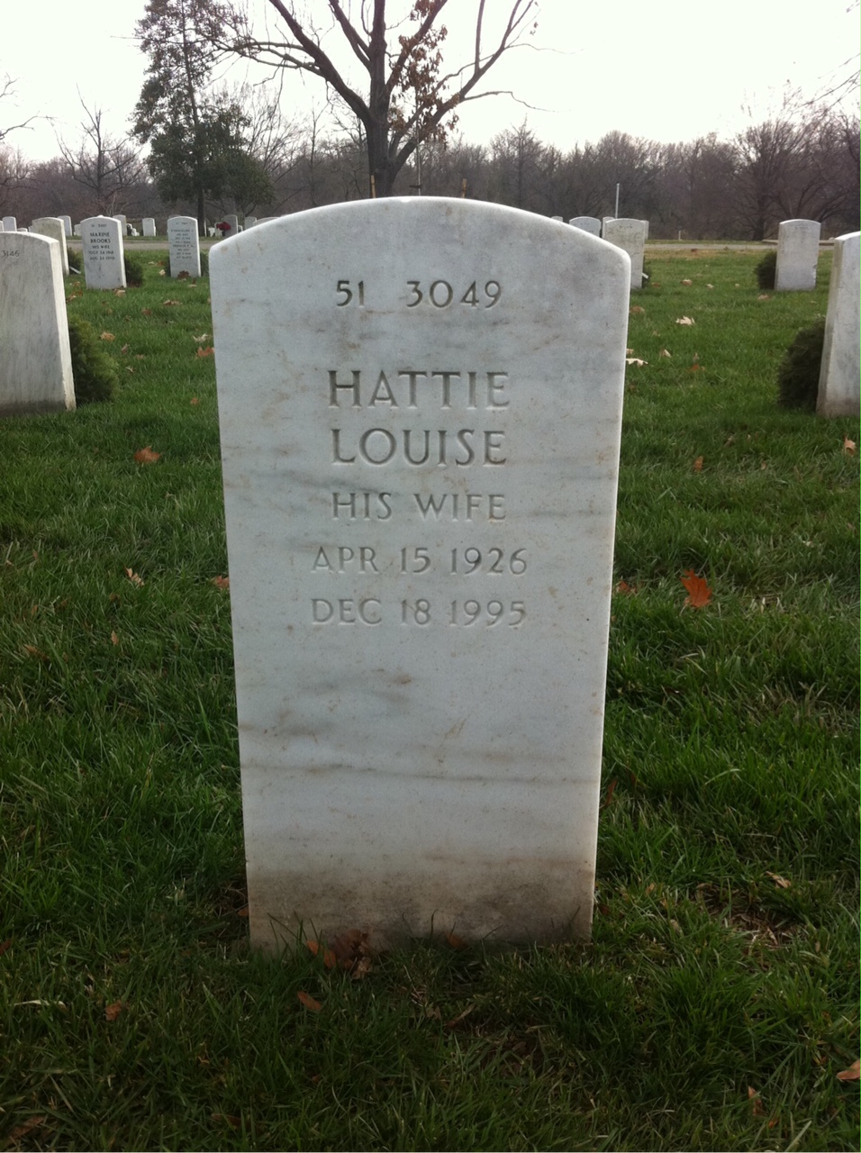 Headstone shared by 2 interments, including Eugene Huggins
