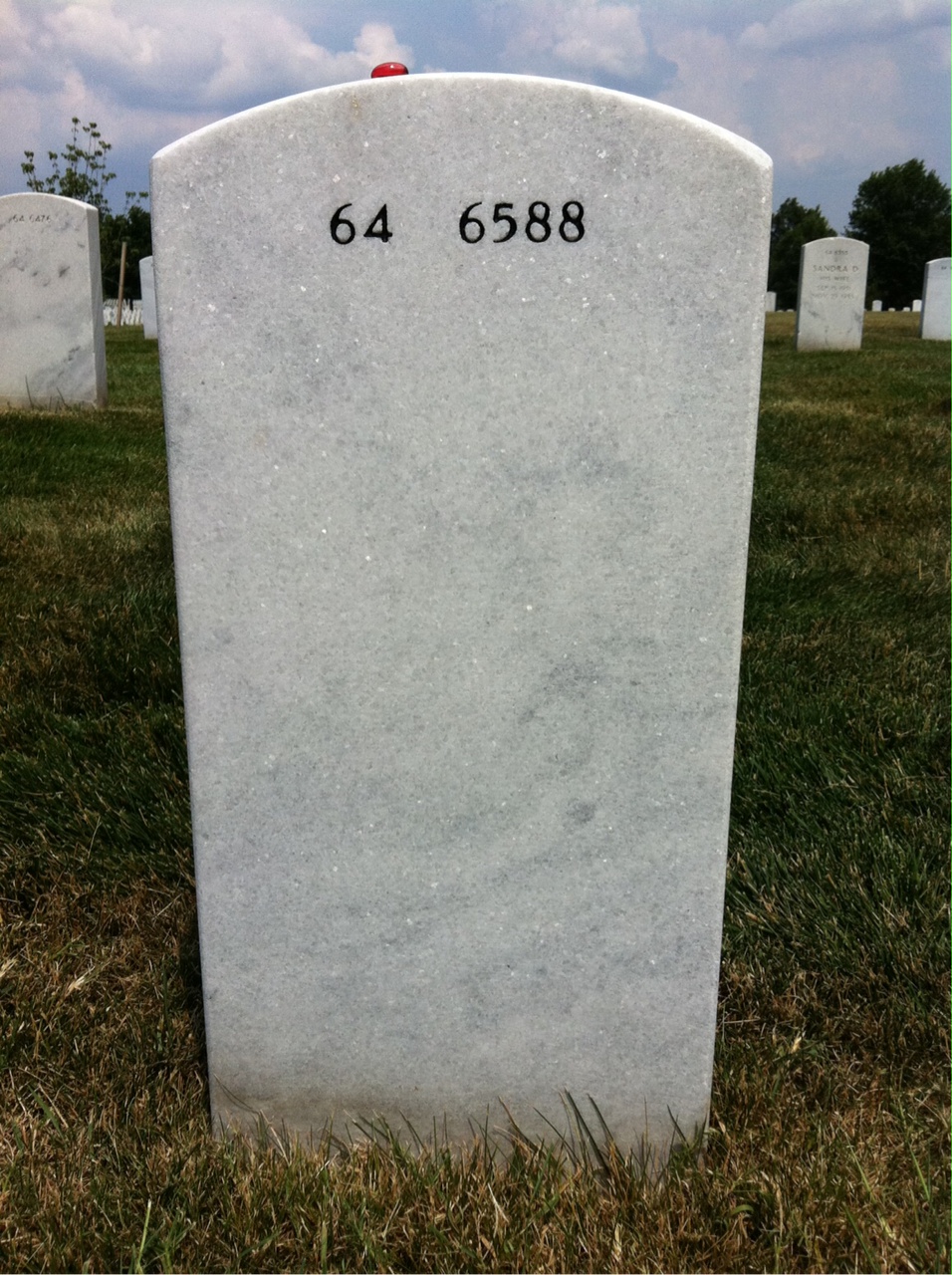 Back of headstone — Paul Rogers