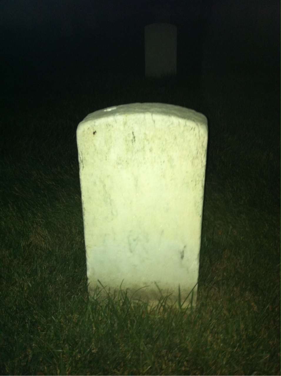 Back of headstone — L Mora