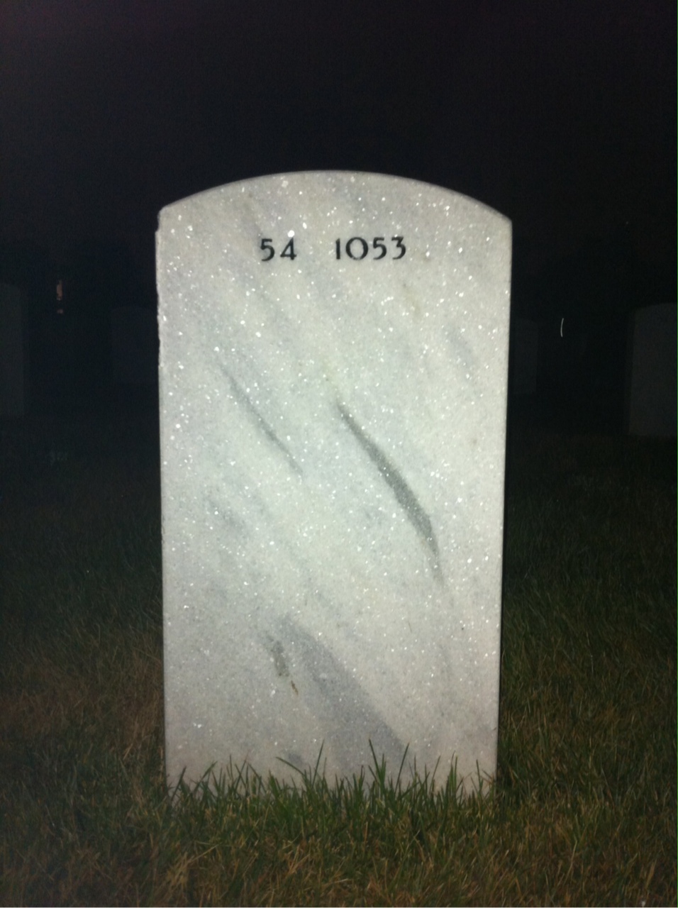 Back of headstone — Marcel Rocque