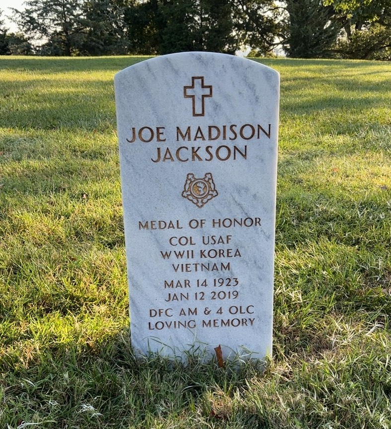 Headstone shared by 2 interments, including Joe M. Jackson