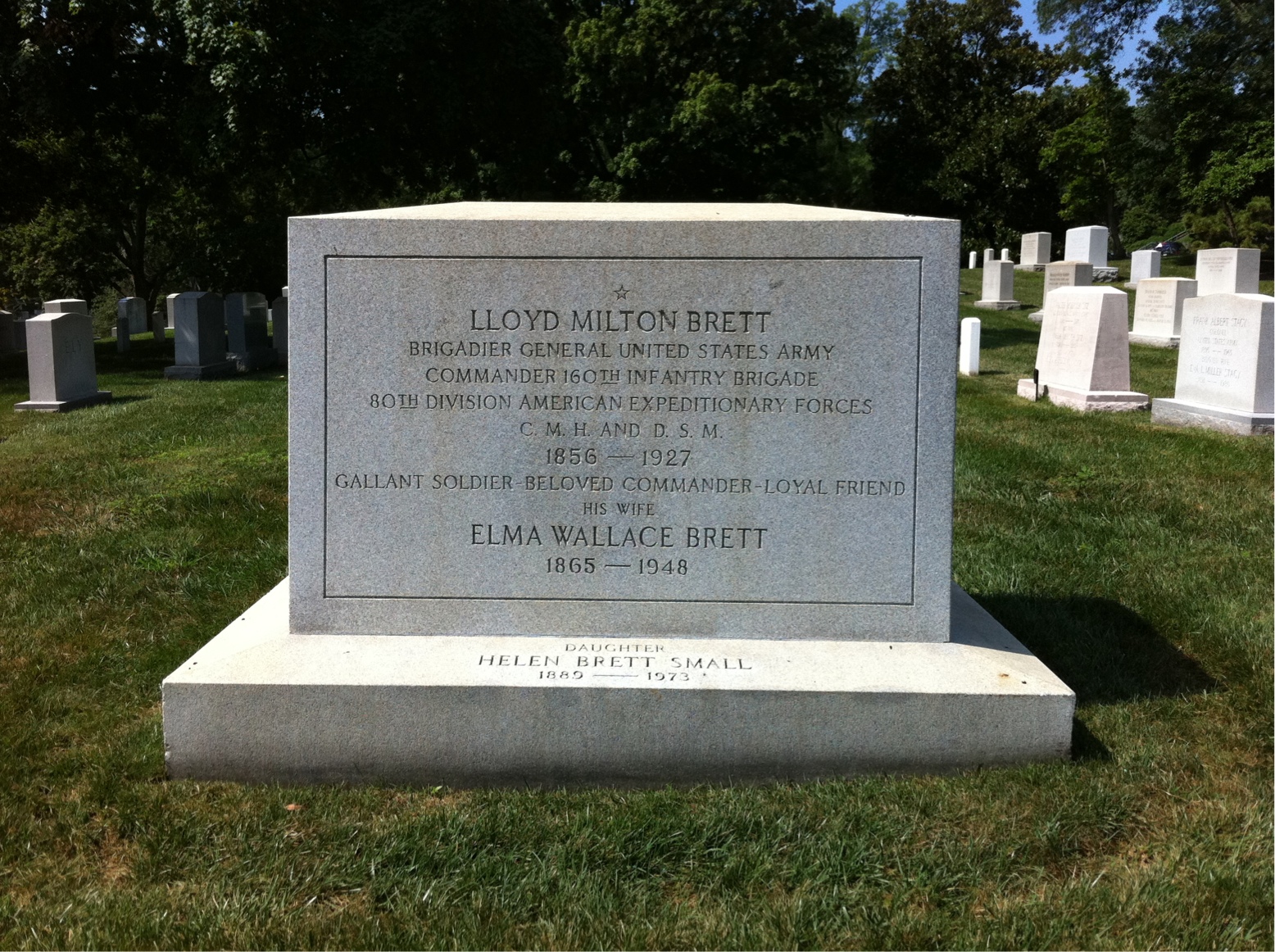 Headstone shared by 2 interments, including Lloyd M. Brett