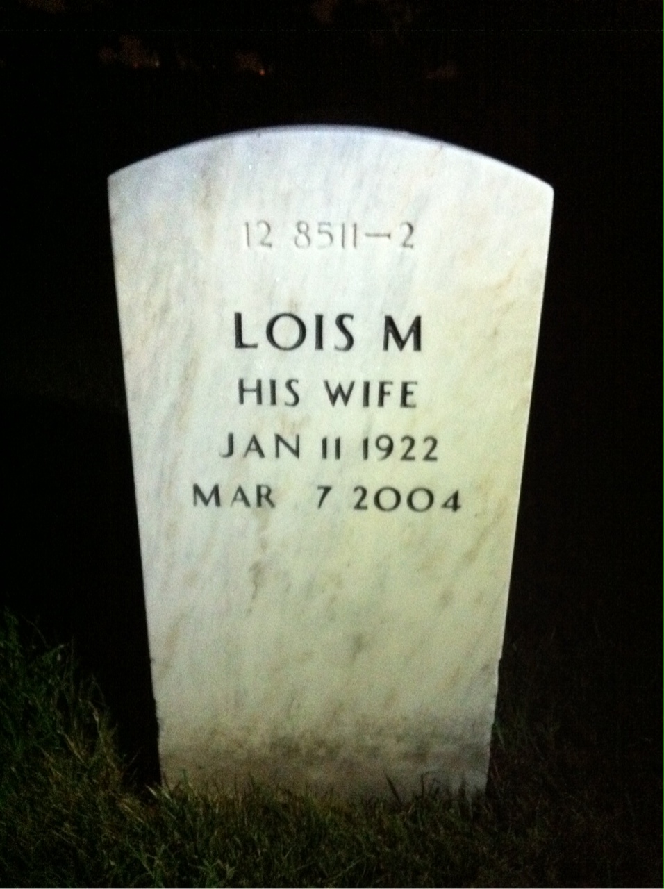 Back of headstone — Lloyd Warnock