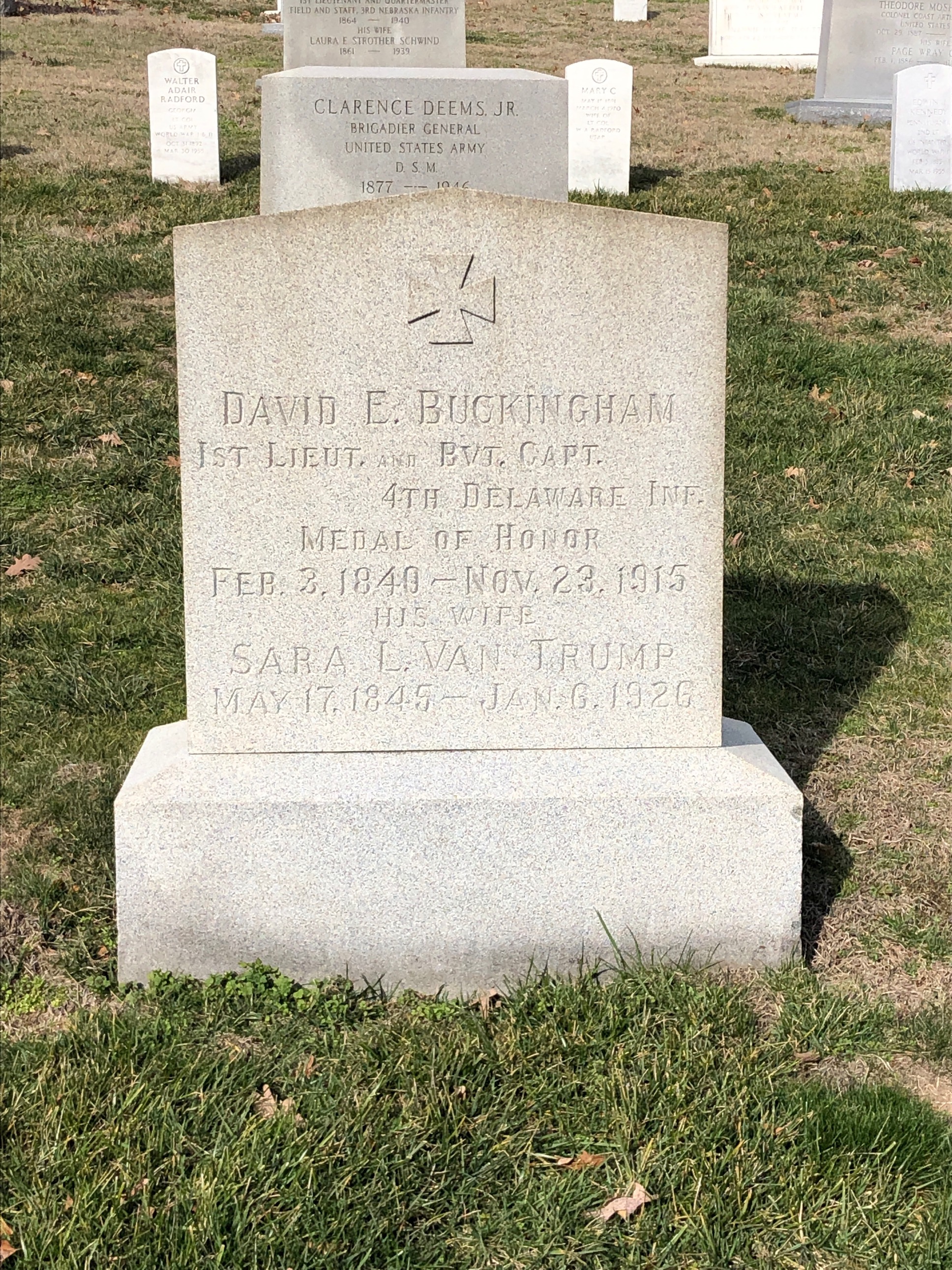 Headstone shared by 3 interments, including David E. Buckingham