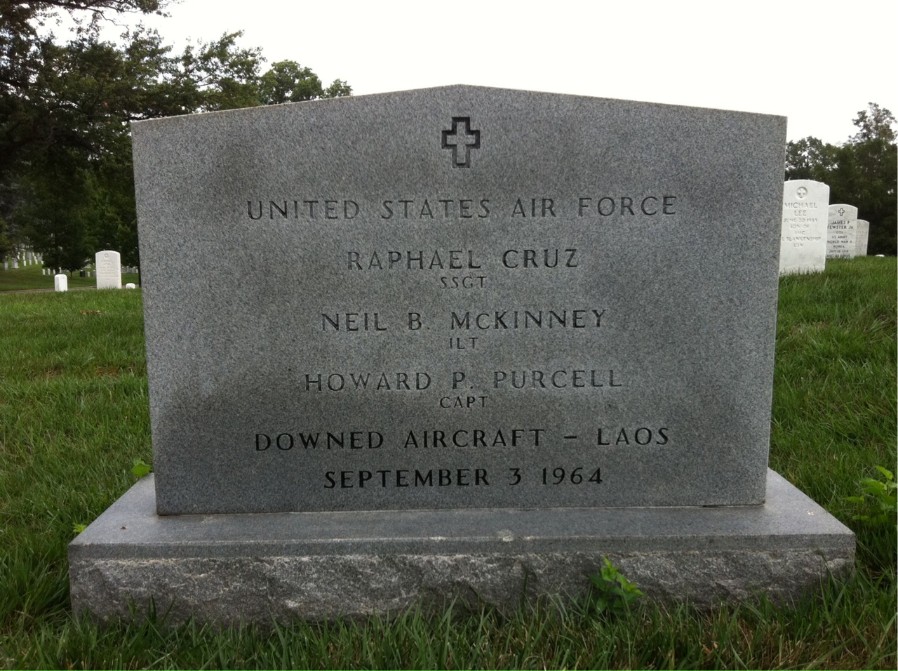Headstone shared by 3 interments, including Howard Philip Purcell