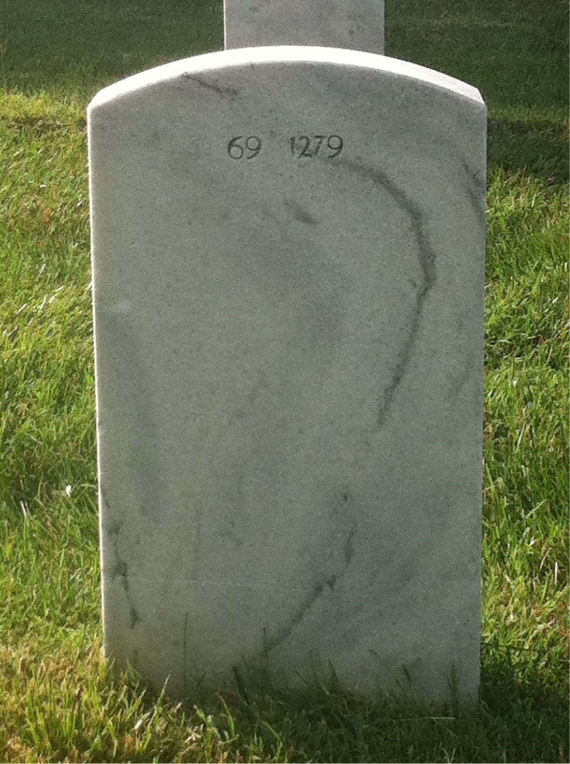 Back of headstone — Paul Baker