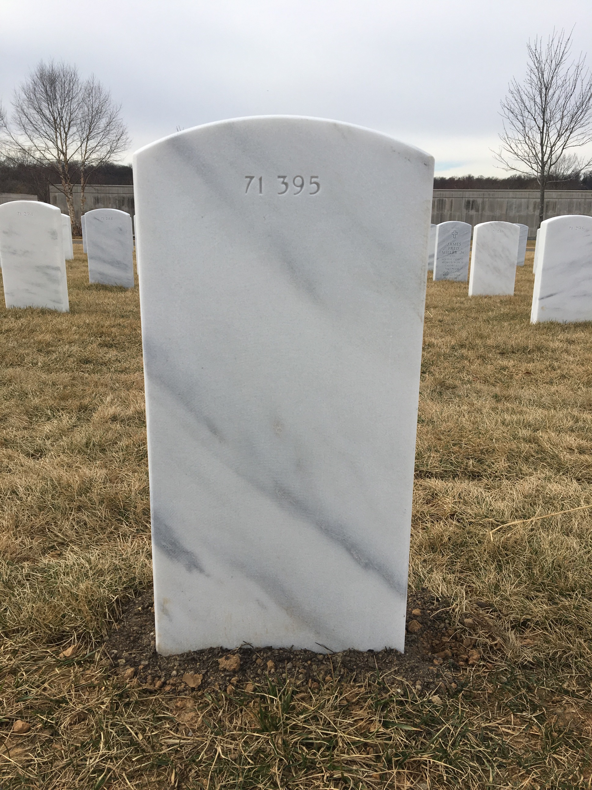Back of headstone — Guido Mustaca