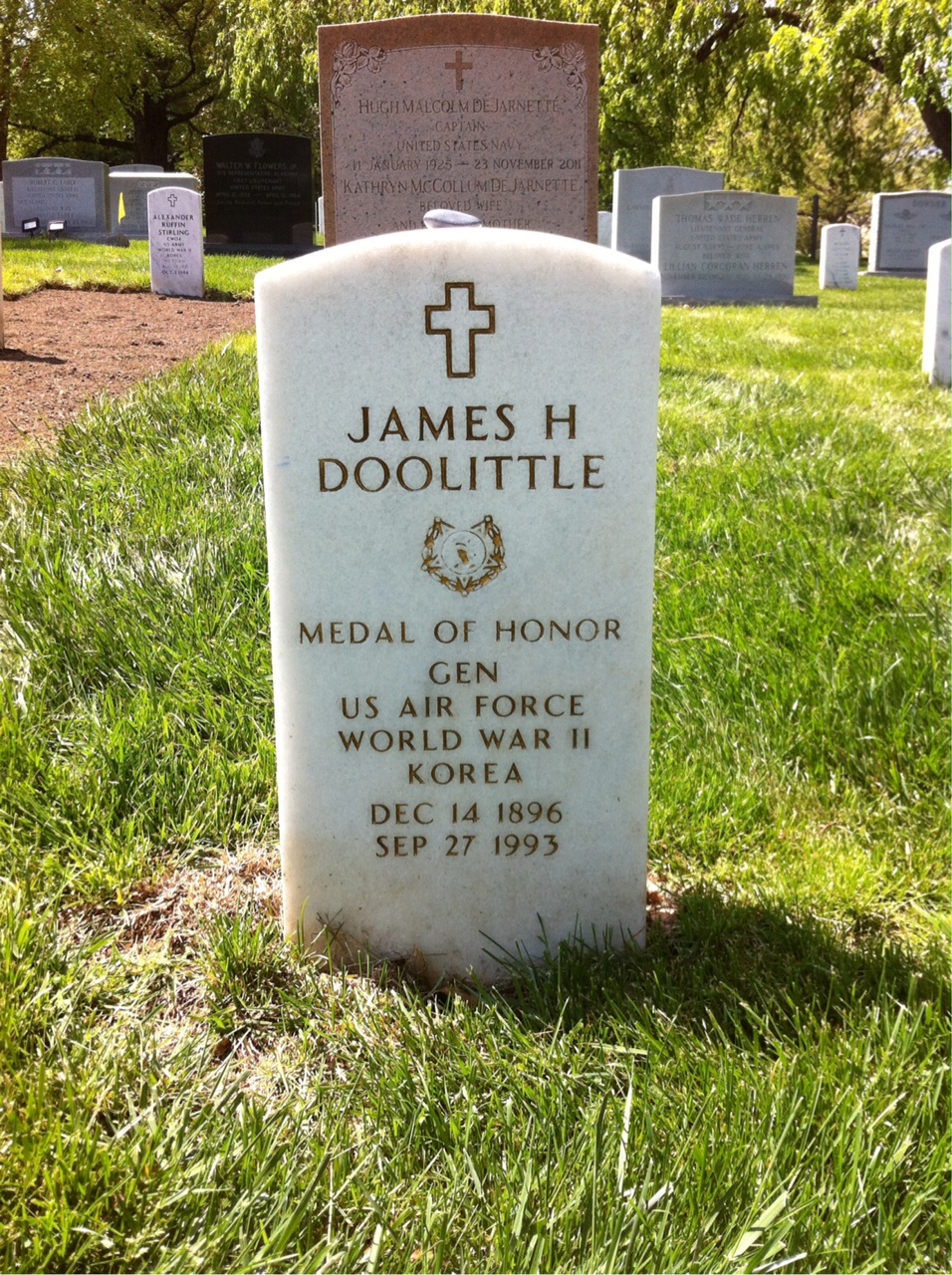 Headstone shared by 2 interments, including James H. Doolittle