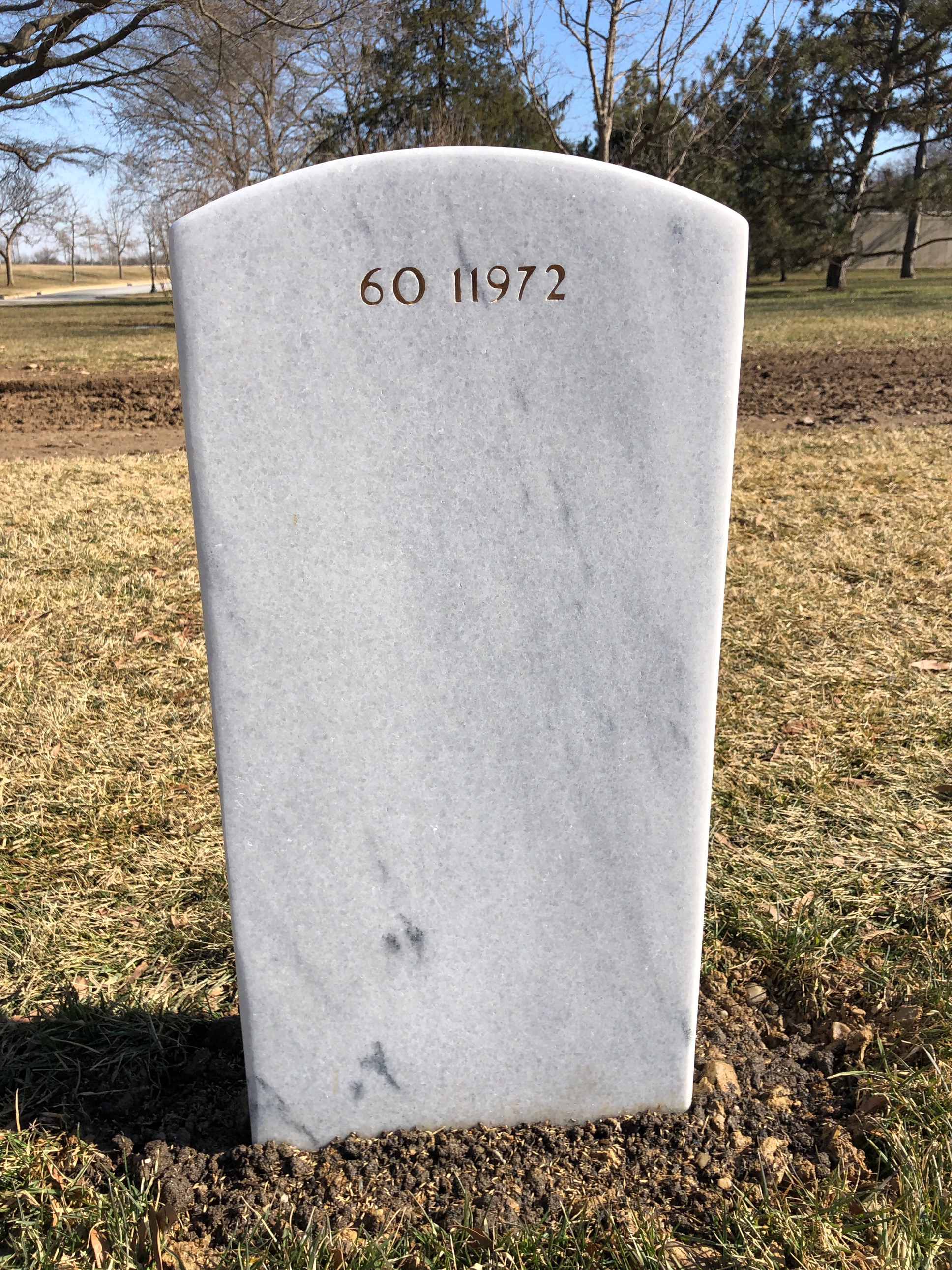 Back of headstone — Ronald J. Shurer