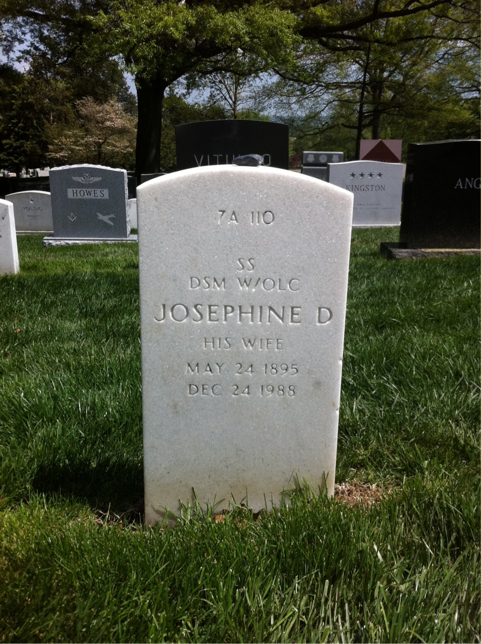 Headstone shared by 2 interments, including James H. Doolittle