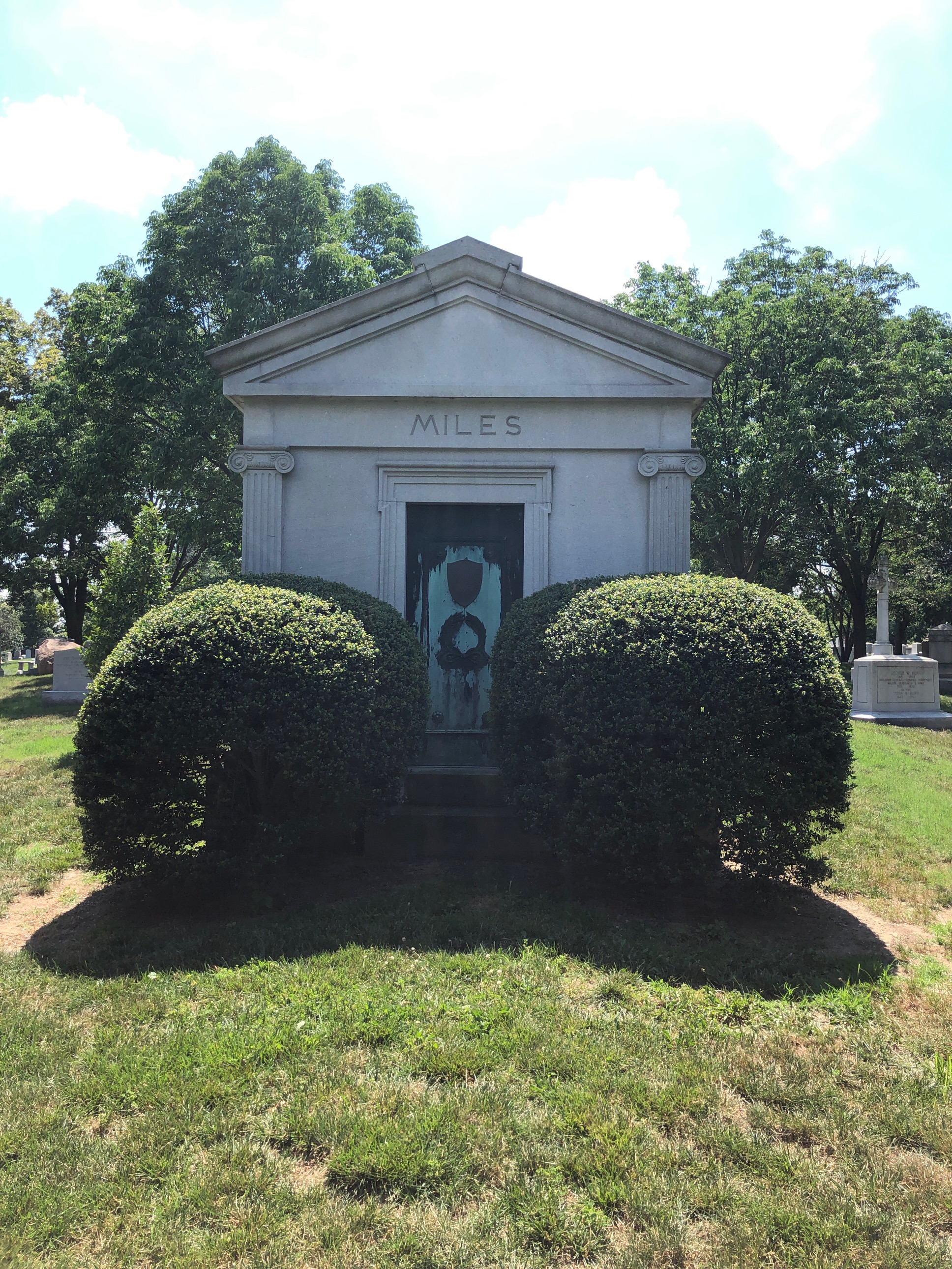Headstone shared by 14 interments, including Nelson A. Miles