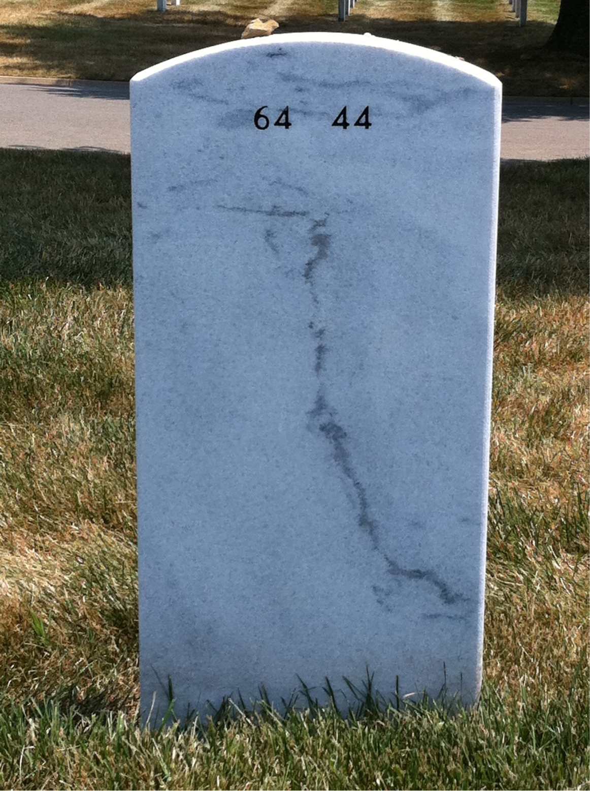 Back of headstone — Nick Apostoles