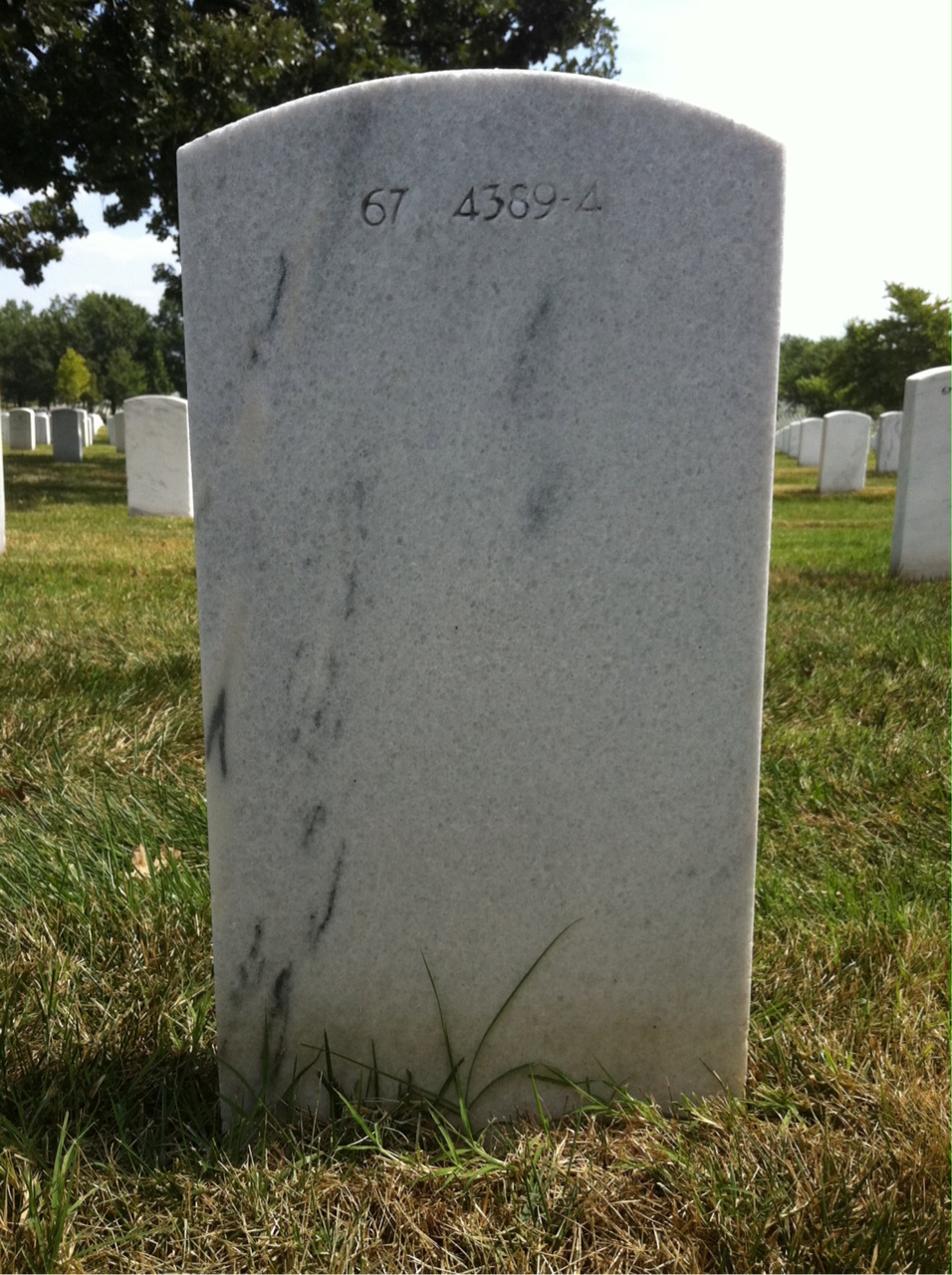 Back of headstone — James T Logan