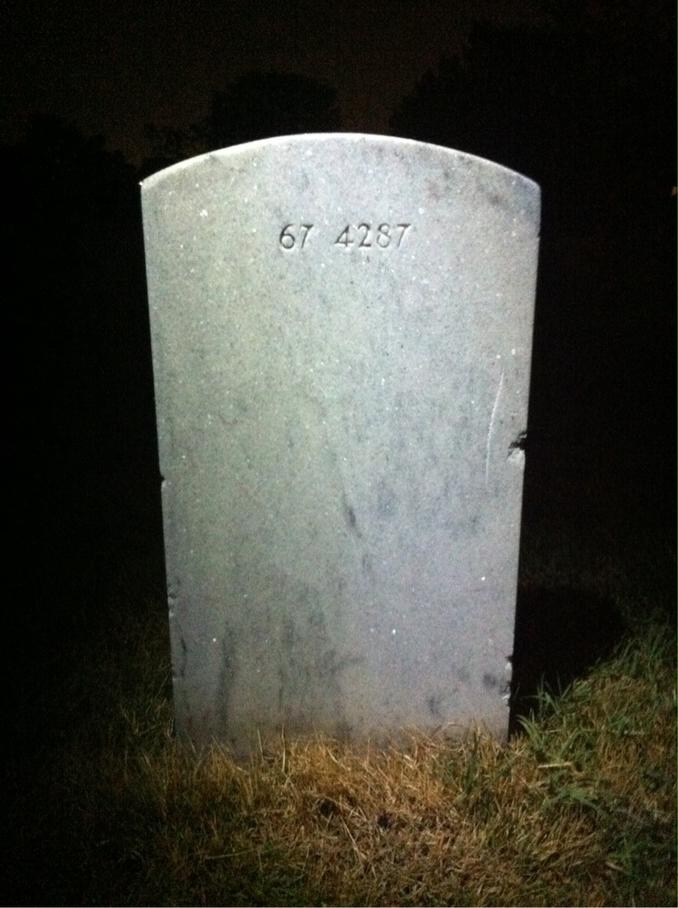 Back of headstone — Leslie Baker