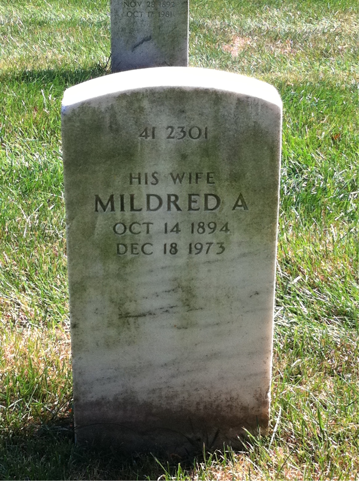 Back of headstone — Dennis Mitchell