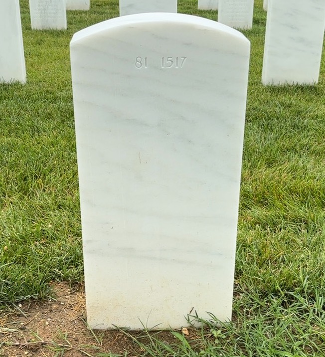 Back of headstone — Marcel Adams