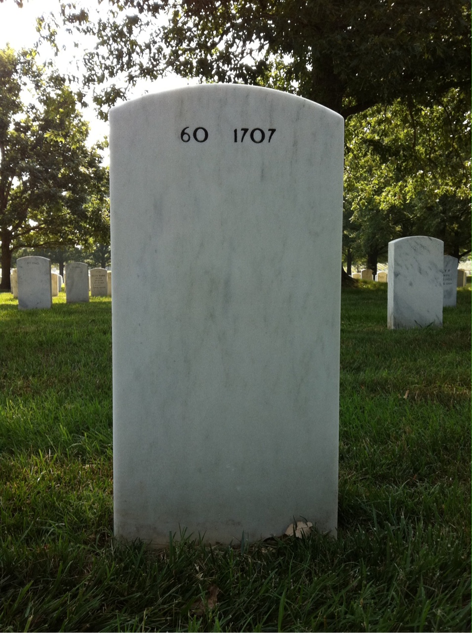 Back of headstone — Carl Ginn