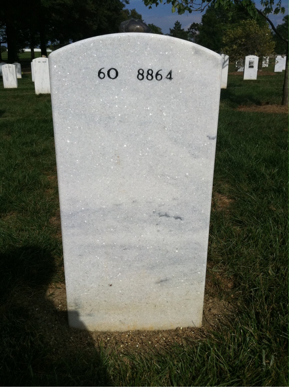 Back of headstone — Xin Qi